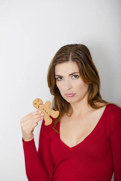 Üzgün kadın ve üzgün zencefilli kurabiye — Stok fotoğraf