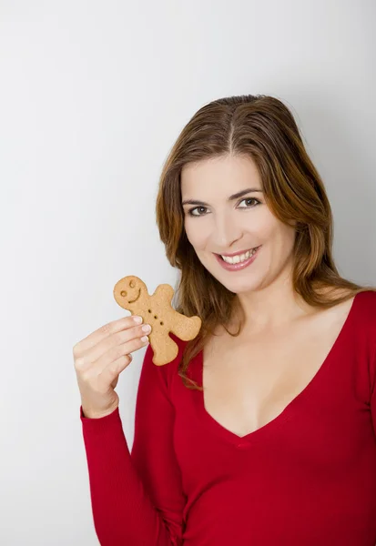 Женщина с пряничным печеньем — стоковое фото