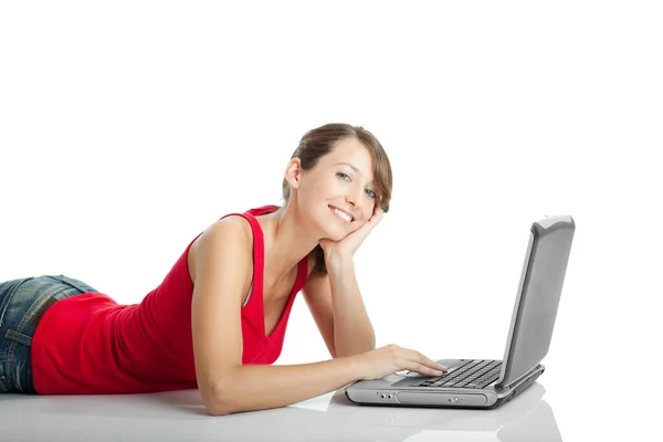 Young woman using a laptop — Stock Photo, Image