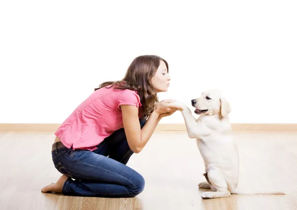 Playing with a puppy — Stock Photo, Image