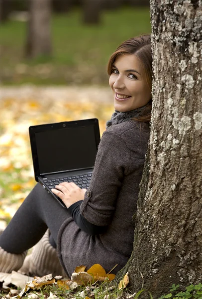 Woman working outdoor Stock Image