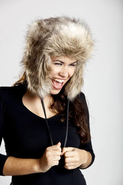 Girl with a fur hat — Stock Photo, Image
