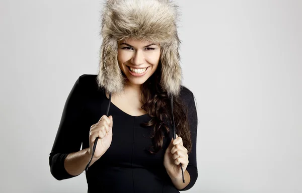 Girl with a fur hat — Stock Photo, Image
