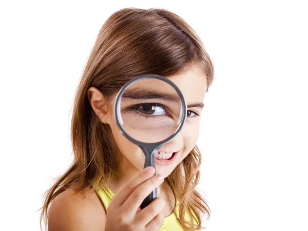 Looking through a magnifying glass — Stock Photo, Image
