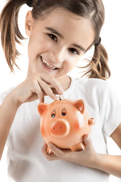 Meisje met een piggy-bank — Stockfoto