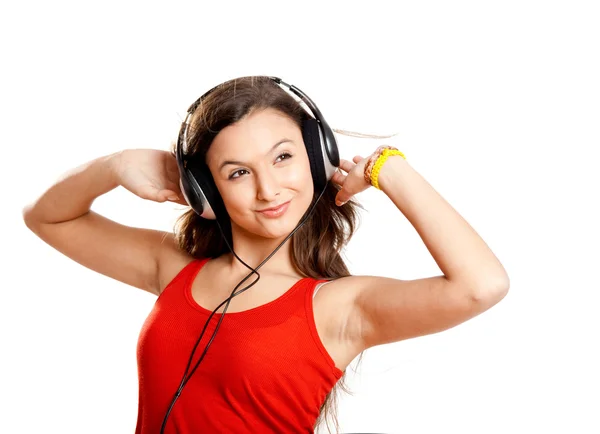 Молодая девушка слушает музыку — стоковое фото