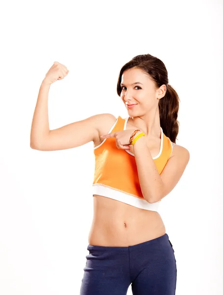 Showing her arm muscle — Stock Photo, Image