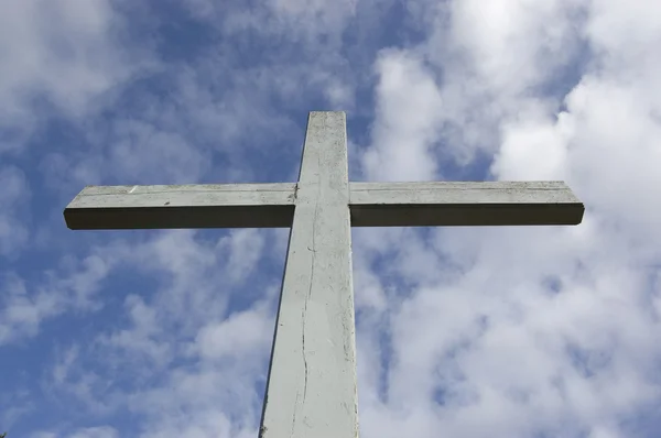 stock image Cross on the cloudy sky