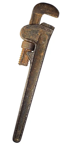 Изолированный ржавый регулируемый гаечный ключ — стоковое фото