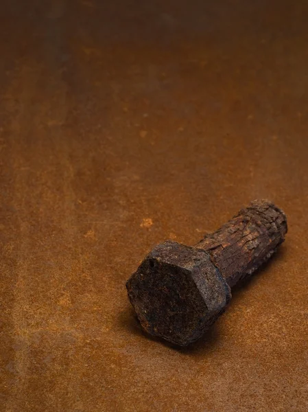 Rusty bolt on rusted plate — Stock Photo, Image
