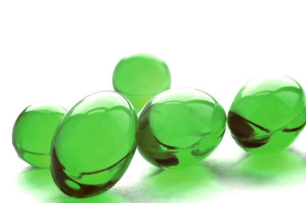 Абстрактные таблетки зеленого цвета — стоковое фото