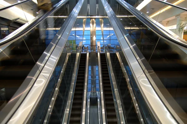 Escalators in airport — Stock Photo, Image