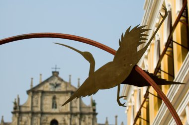 Statue of egret and Cathedral clipart