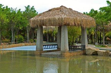 Pavilion with thatch roof clipart