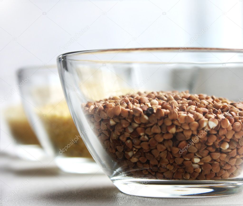 Buckwheat, couscous and rice in glass
