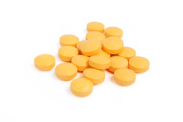 Högen av orange piller — Stockfoto
