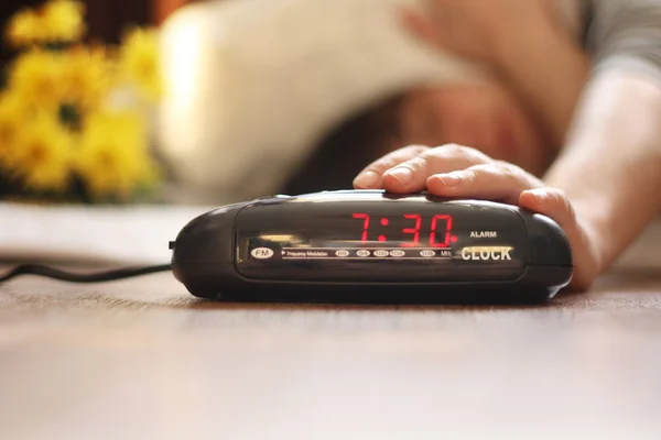 Turning off alarm clock — Stock Photo, Image