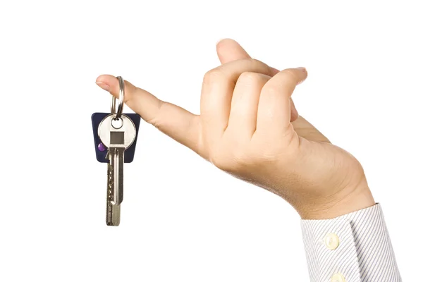 Žena držící klíč — Stock fotografie