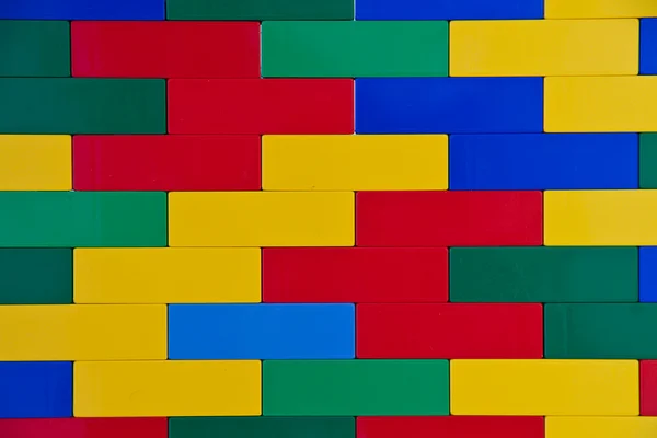 Kolorowe zabawki mur — Zdjęcie stockowe