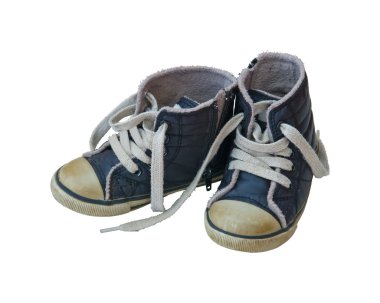 Used shoes of a little boy clipart