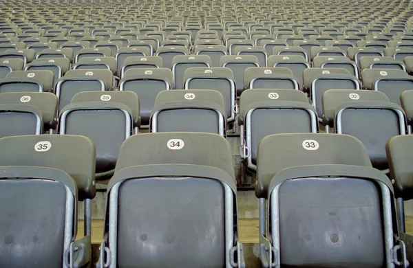 Grå stadion sittplatser — Stockfoto