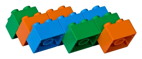 Tijolos de brinquedo azul, verde e laranja — Fotografia de Stock