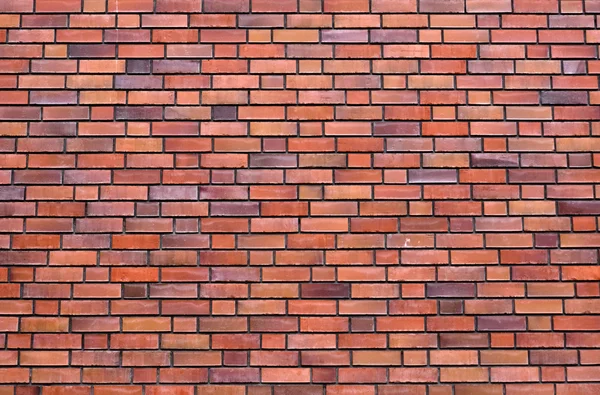 Uma parede de tijolo vermelho — Fotografia de Stock