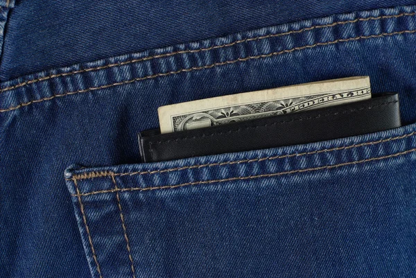 Wallet with money in jeans pocket — Stock Photo, Image
