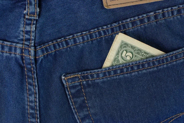 Spänn i jeans ficka — Stockfoto