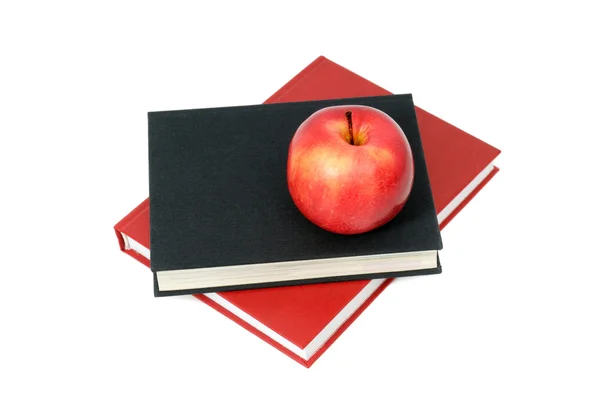 Червоне яблуко на книзі — стокове фото