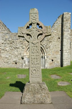 Celtic cross in Clonmacnoise, Ireland clipart