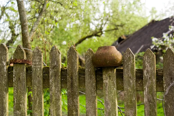 Pot on a fence — Stock Photo, Image
