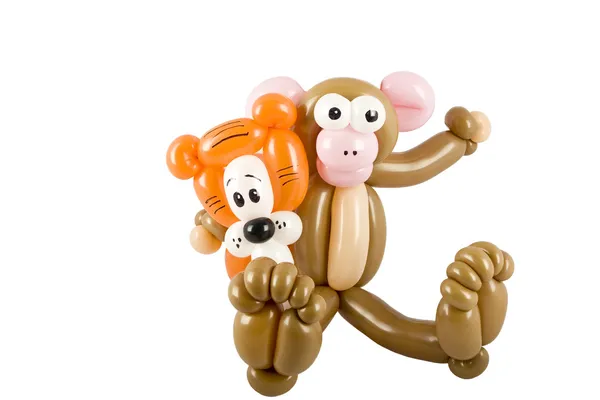 Globo animal mono y tigre Imágenes de stock libres de derechos