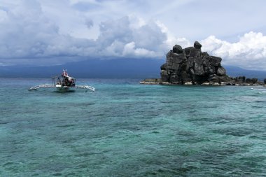 Apo island dive boat Philippines clipart