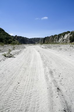 Off road tyre tracks mount pinatubo volcanic landscape philippines clipart