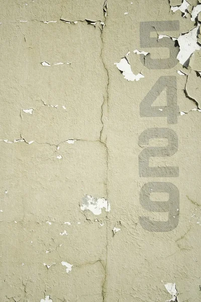 Numbers stenciled on old wall background texture — Stock Photo, Image