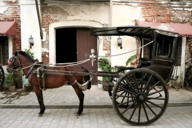 Calesa Horse drawn carriage vigan in the philippines clipart