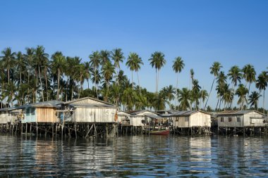 Mabul island stilt houses borneo clipart