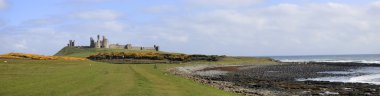 Dunstanburgh castle northumberland coast clipart