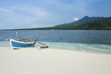 Camiguin island outrigger fishing boat clipart