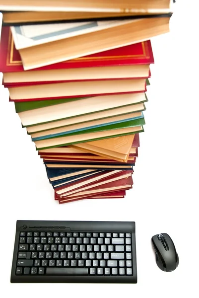 Boeken en toetsenbord — Stockfoto
