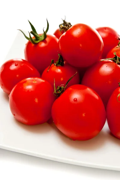 Tomates en plato —  Fotos de Stock
