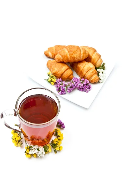 Čaj a croissanty — Stock fotografie