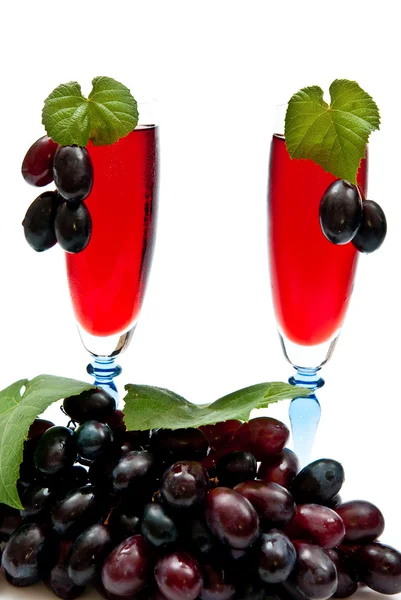 stock image Red wine and grapes