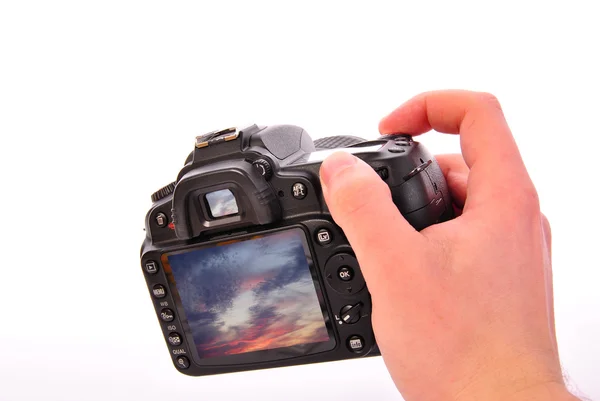 Digital camera in hand — Stock Photo, Image