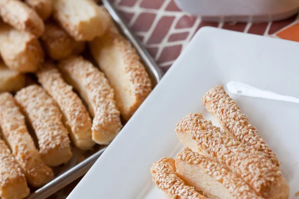 stock image Pastry cakes with sugar on plate.