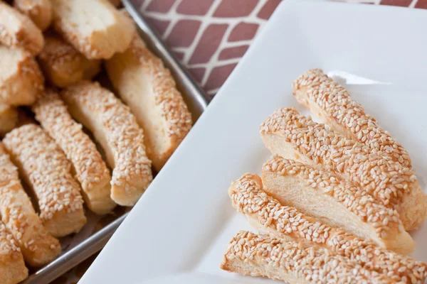 stock image Pastry cakes with sugar on plate.