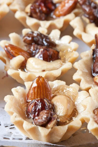 stock image Pastry cakes with sugar on plate.