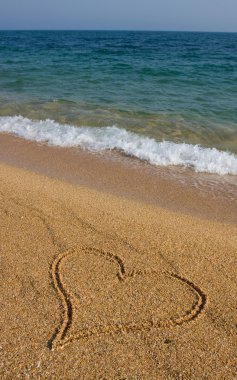 Heart in the sand. clipart