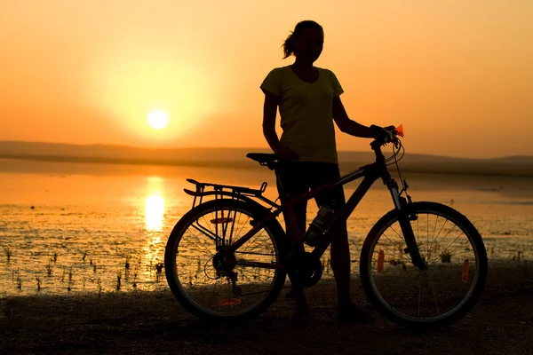 Girl with bicycle. — Stock Photo, Image